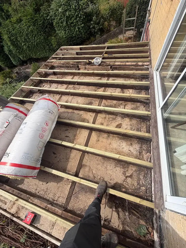 Flat roof stripped back to the joists on the neighbouring Chatham job