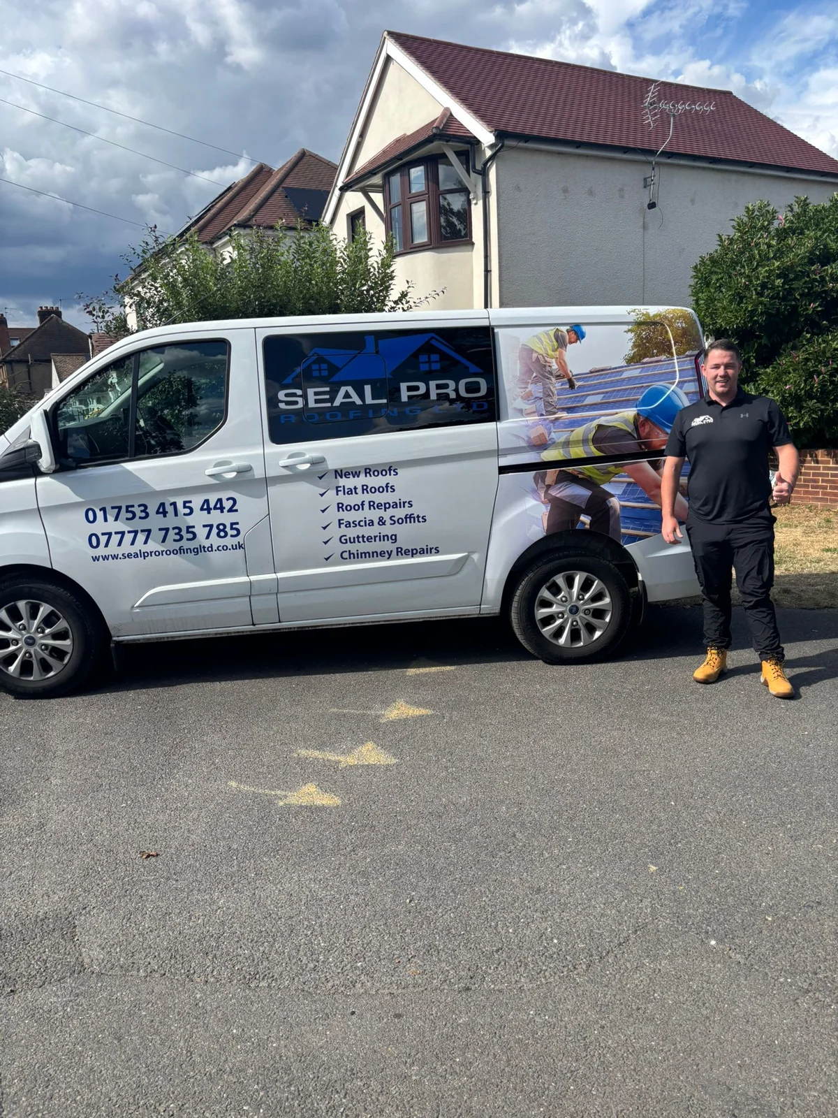Cornelius, owner of Seal Pro Roofing Ltd, with the Seal Pro Roofing van