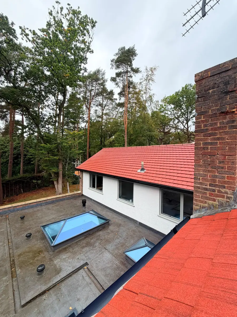 Finished full re-roof with new red tiles and a large new flat roof in Fleet, Hampshire