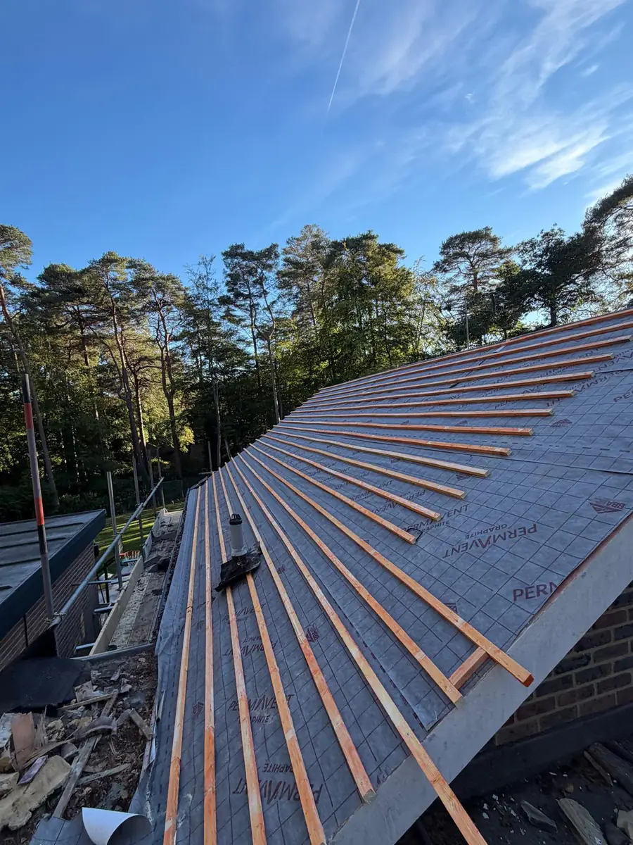 New breathable membrane and new battens on the stripped roof in Fleet