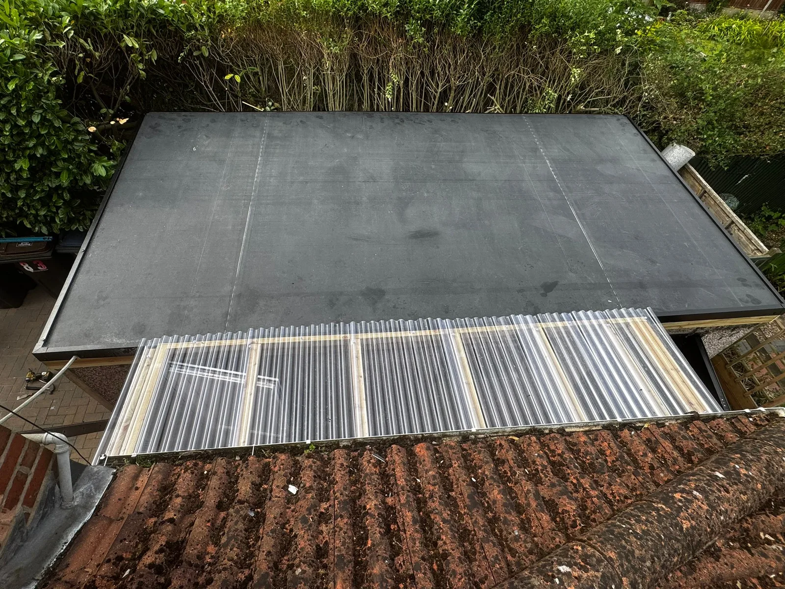 New flat roof with three-layer system in Kingston