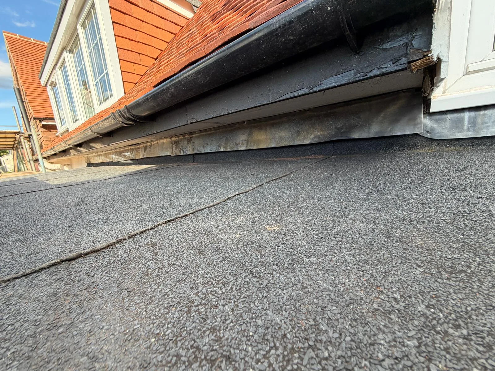 Clay tiles being laid by the Seal Pro Roofing team in Richmond