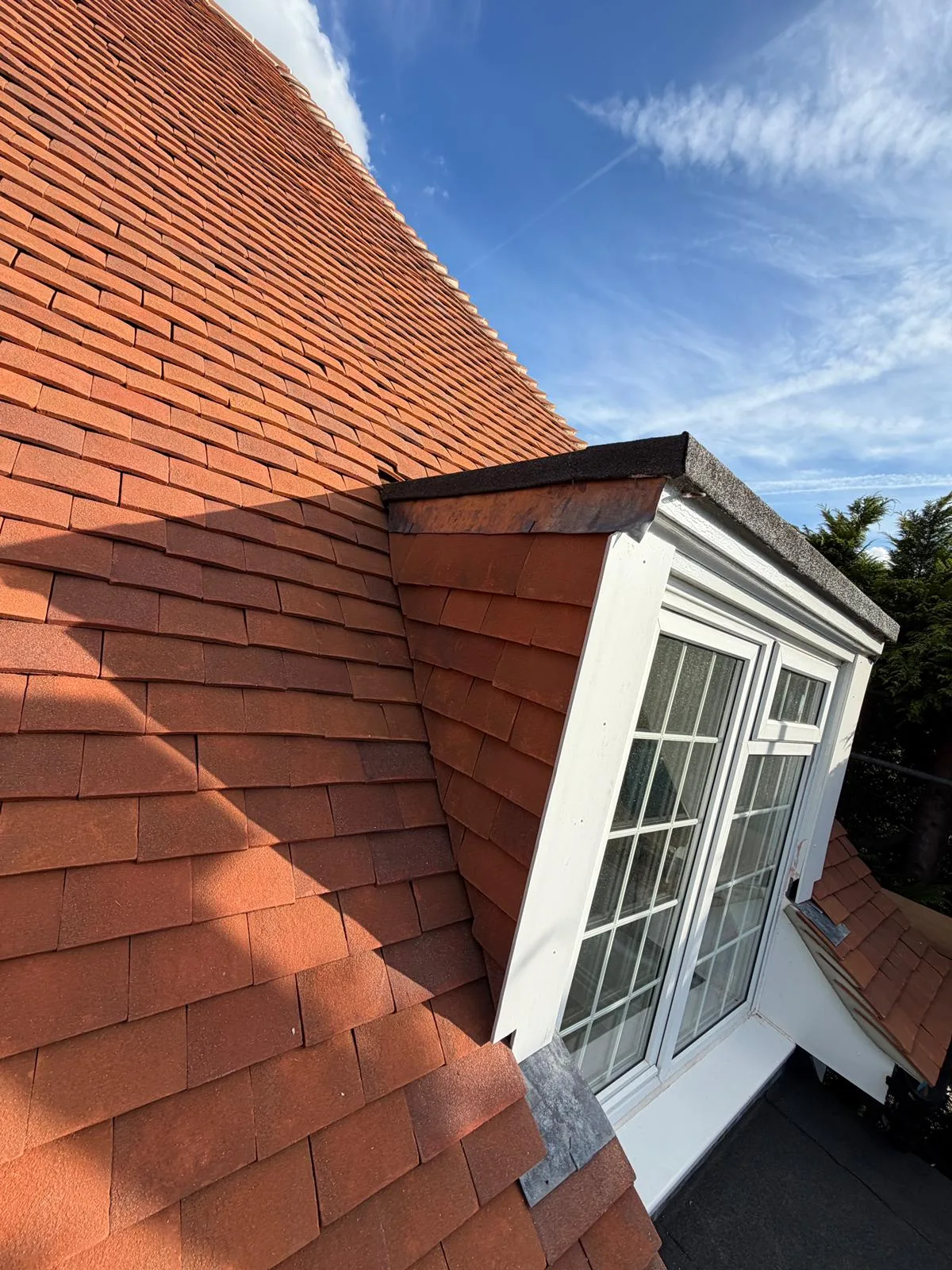 Completed new clay tile roof in Richmond