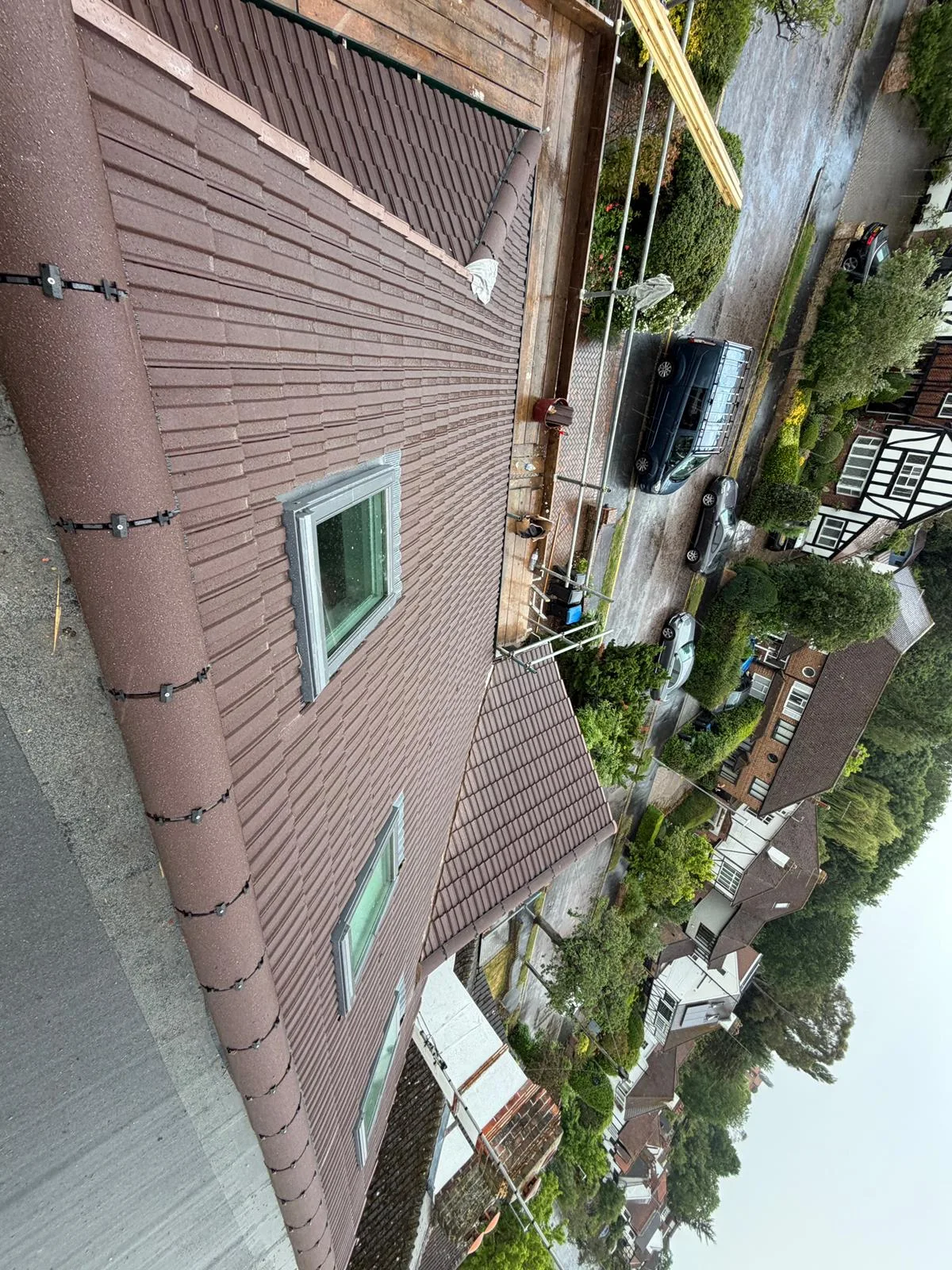 Concrete tile re-roof in progress on our Surbiton project