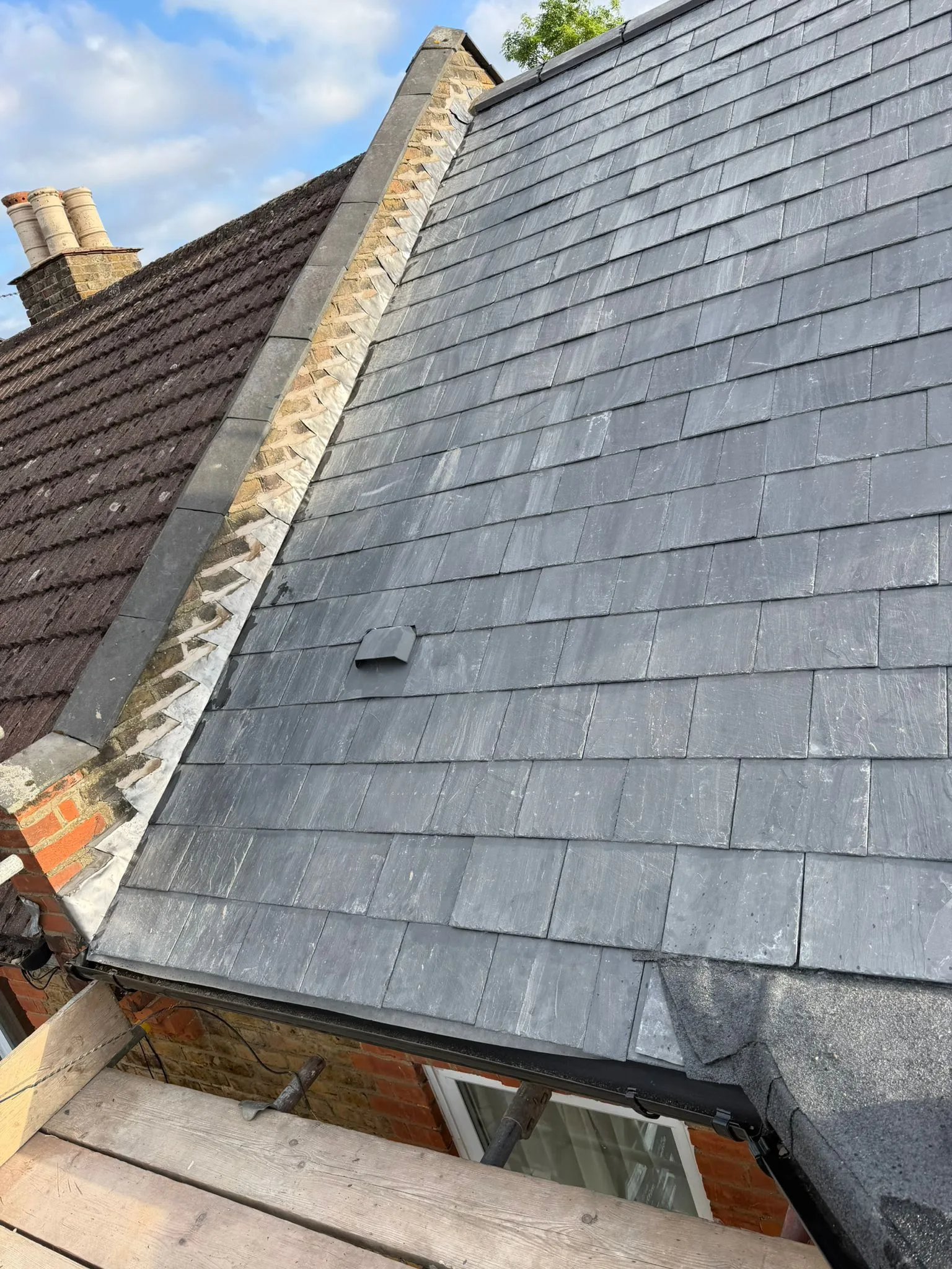 Slate roof repair and installation by Seal Pro Roofing